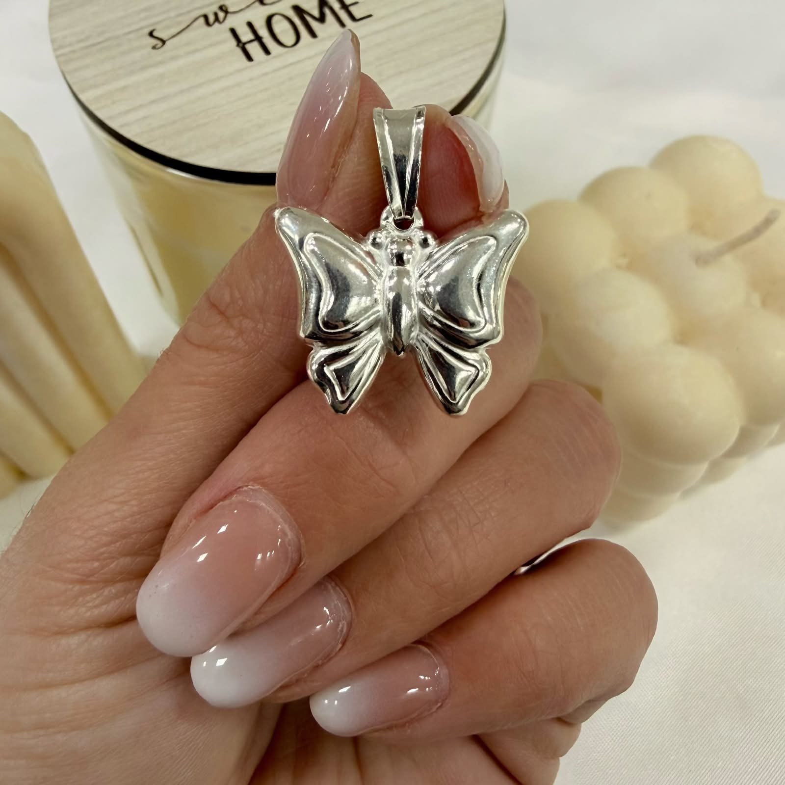 Dije a mariposa inflado