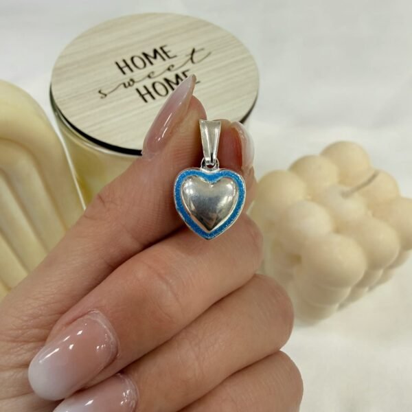 Dije a corazon inflado celeste
