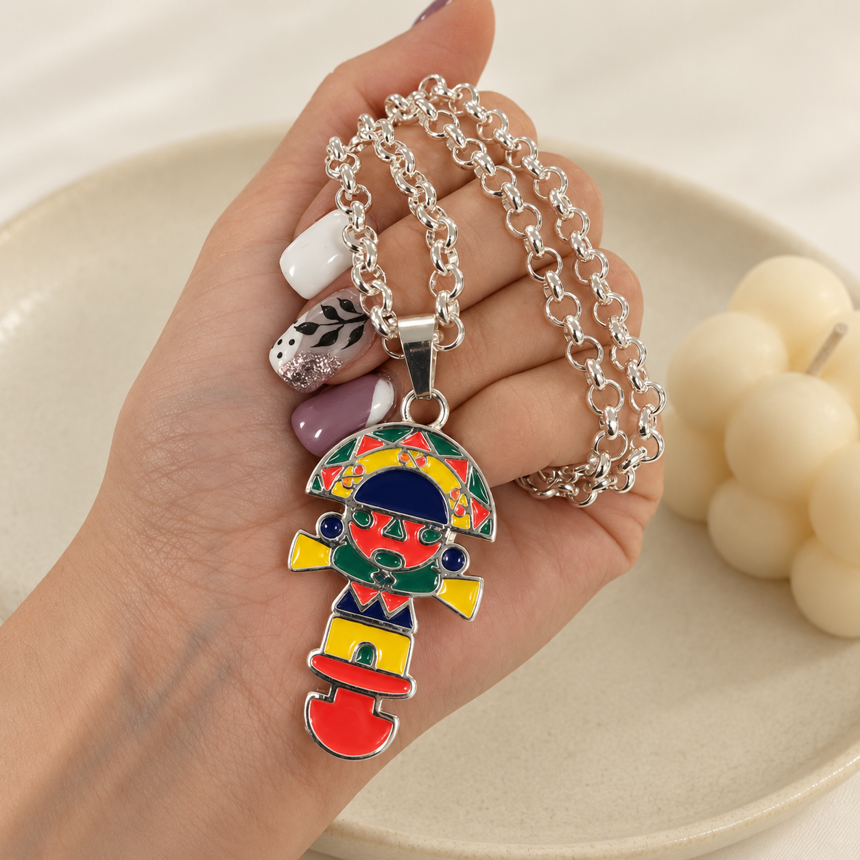 a conjunto (cadena segun stock )con dije peruano azteca