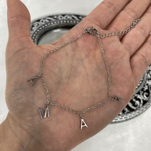 a Pulsera con dijes "amar"