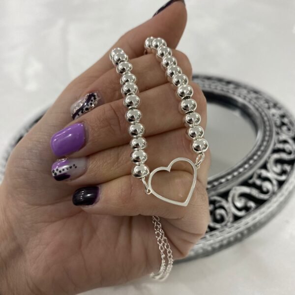 a conjunto gargantilla bolas y corazones 2