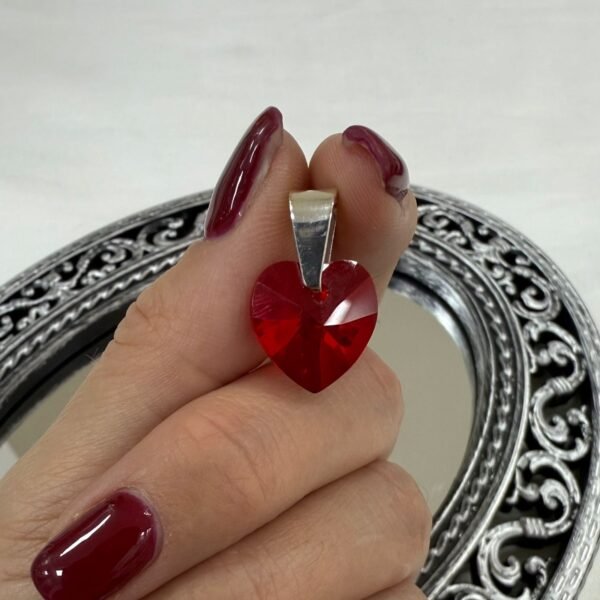 a  Dije a cristal sw corazon rojo 14mm
