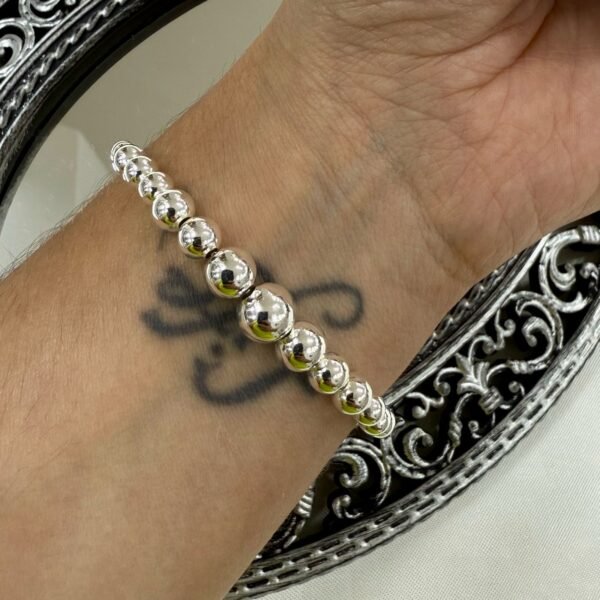 Pulsera Asic 5 (completa bolitas)