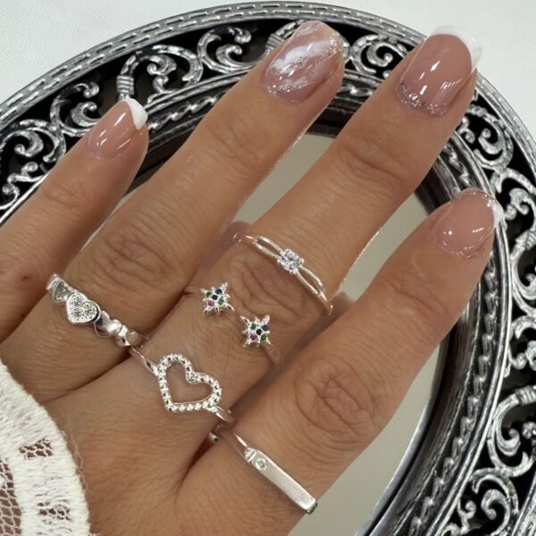 a a kit x 5 anillos plata mod J