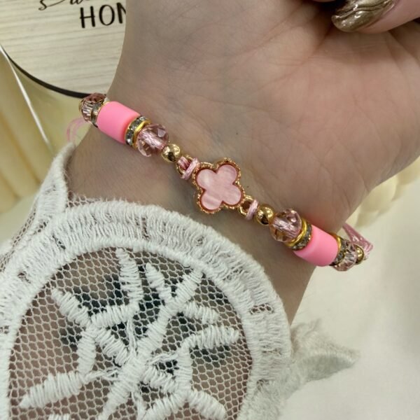 pulsera Van CL ajustables con bolitas facetadas doradas rosa