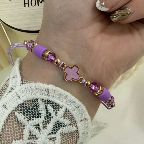 pulsera Van CL ajustables con bolitas facetadas doradas lila
