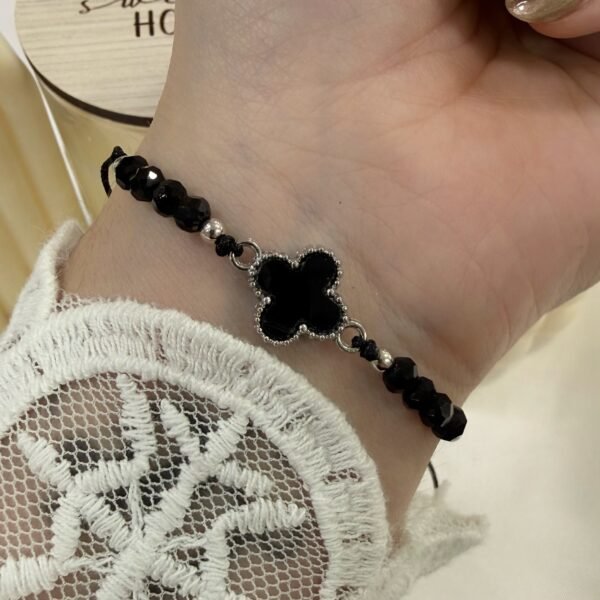 pulsera Van CL ajustables con bolitas facetadas plateadas negra