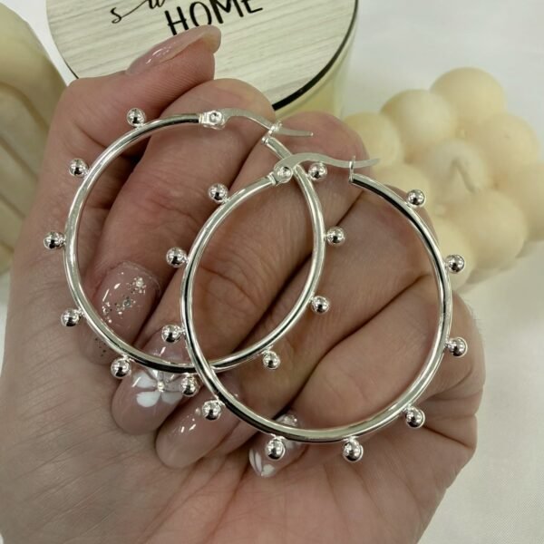 argollas con bolitas