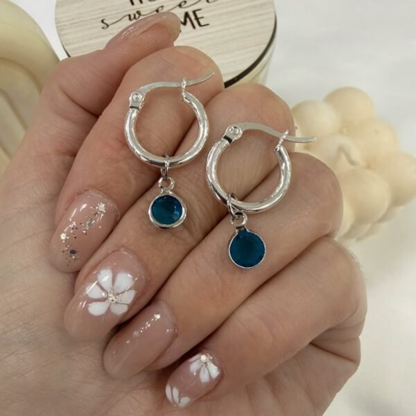 argollas con dije cristal celeste