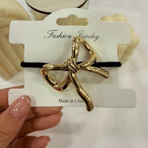 colita diseño dorada mod 14