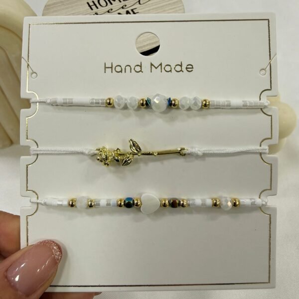 set x 3 pulseras extensibles encartonadas rosilla blanca