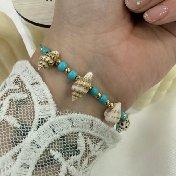 pulsera Van CARACOLES ajustables con bolitas  turqueza y doradas