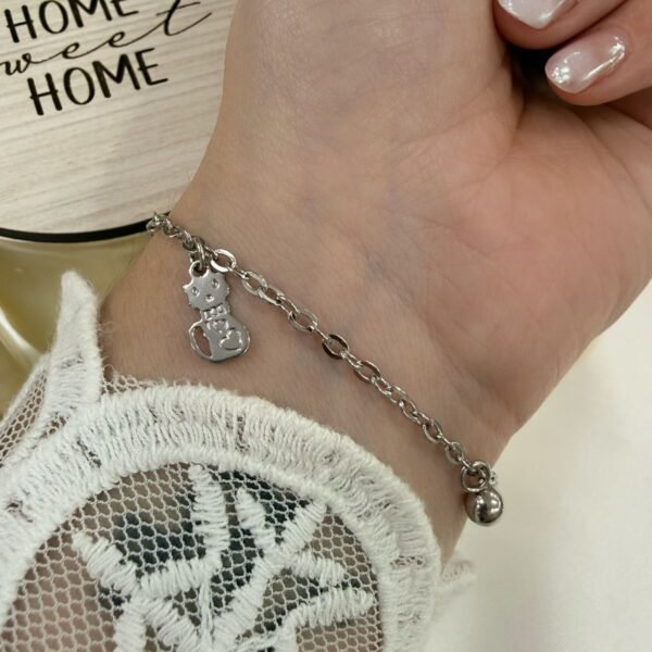 a pulsera con dijes gatito a.q