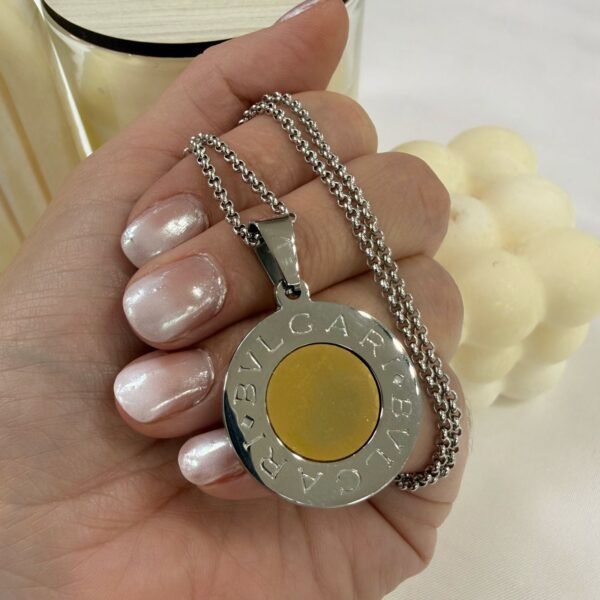 D conjunto tipo bul 6 mediano  con cadena rolito a.q