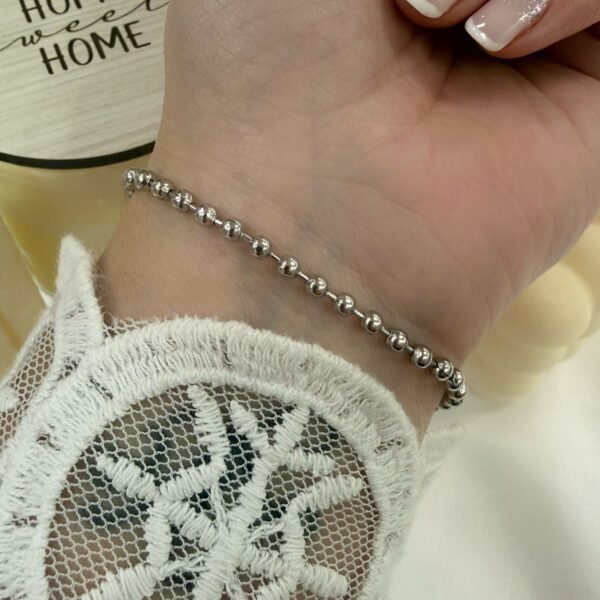 a a pulsera bolitas