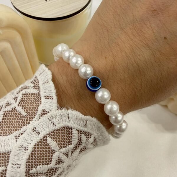 pulsera perla blanca celeste ojito