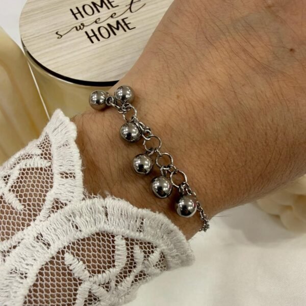 pulsera bolitas colgantes a.q outlet