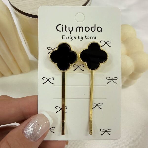 hebilla dorada Lv negra x par.