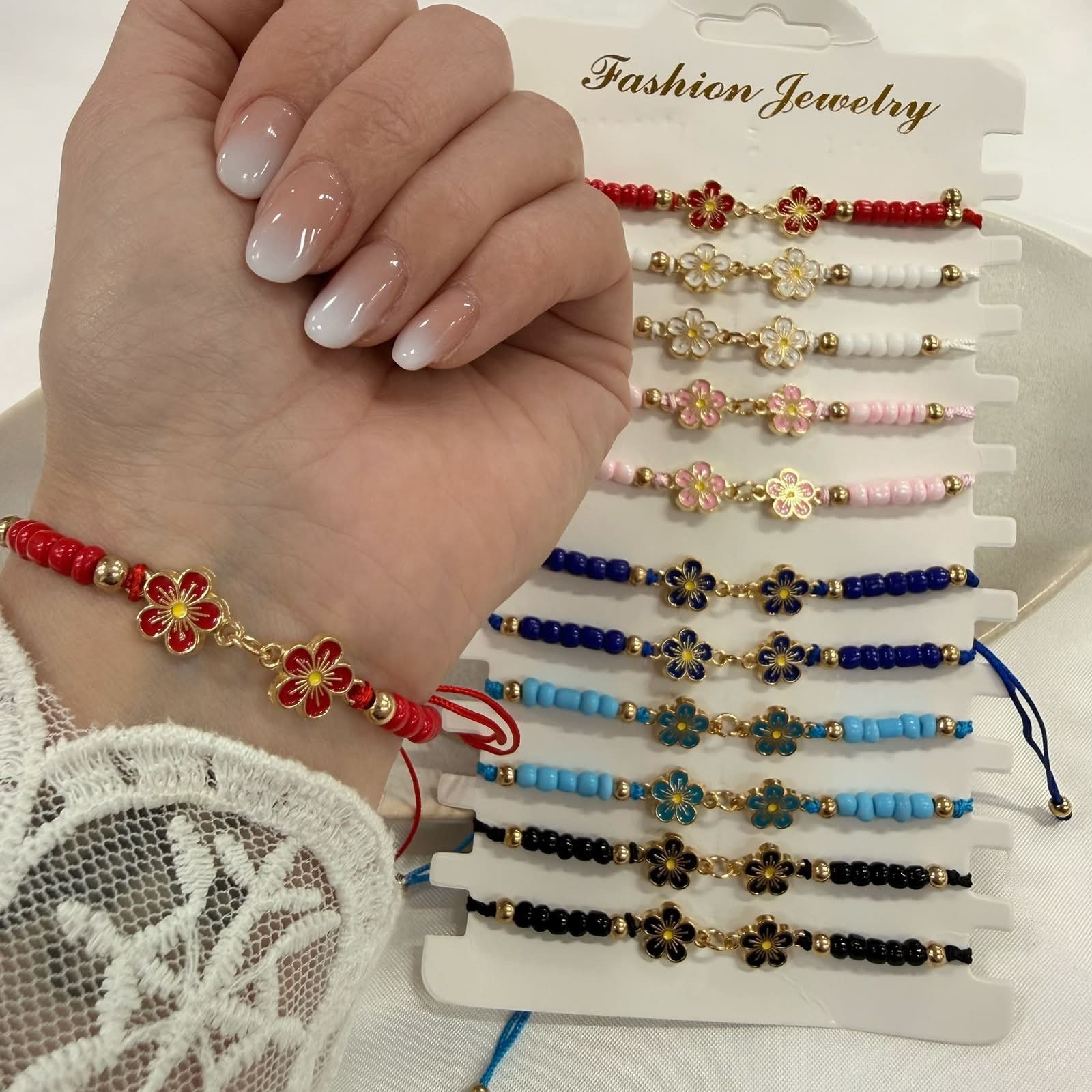 pulsera Van CL 12 flor esmaltada ajustables con bolitas facetadas x unidad