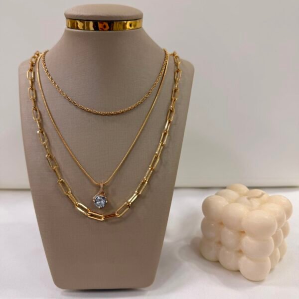 a 0 set x cadenas triples doradas modelo L