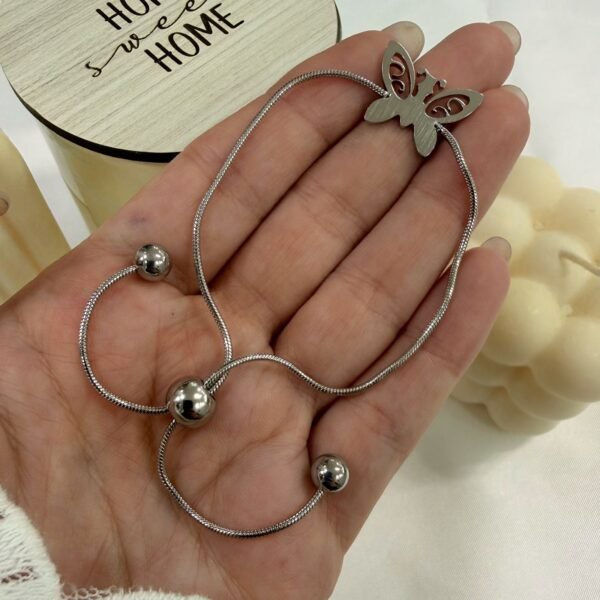 Alternative view of a Pulsera cola rata mariposa a.q