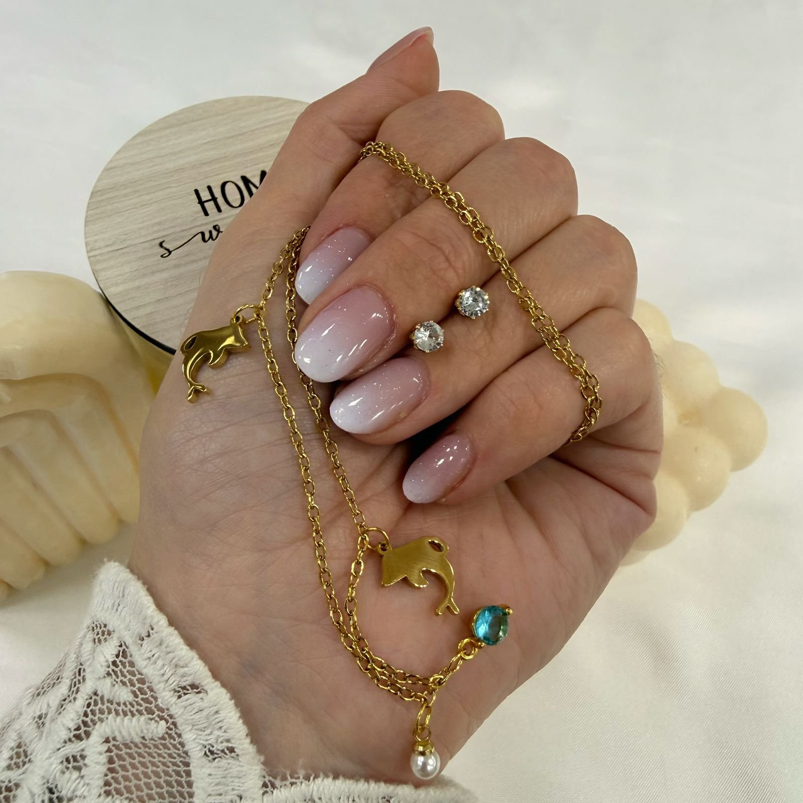 conjunto con dije dolphin cubic y aros dorado