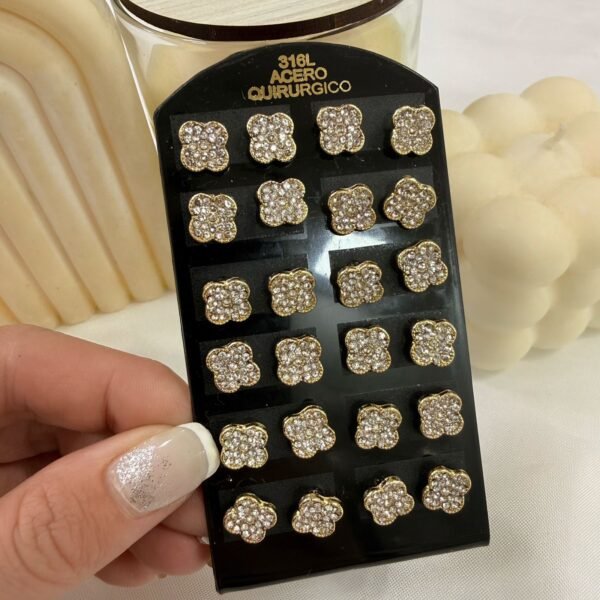 a a blister x 12 pares trebol dorados