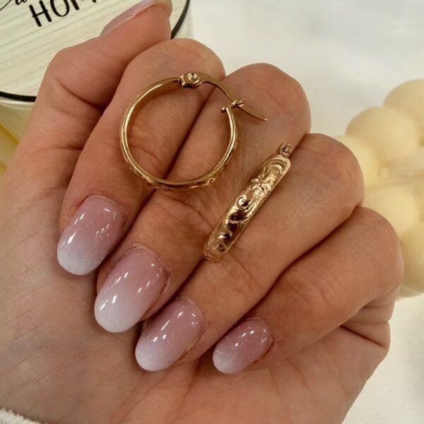 Alternative view of a a blister x 6 pares aros Rose mod 12 ($1000 el par)