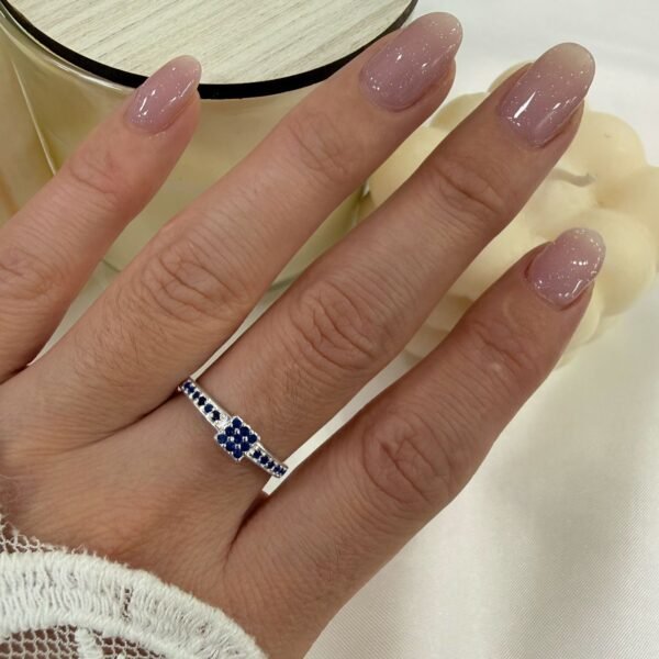 a Anillo AF microzirconia J azul zafiro