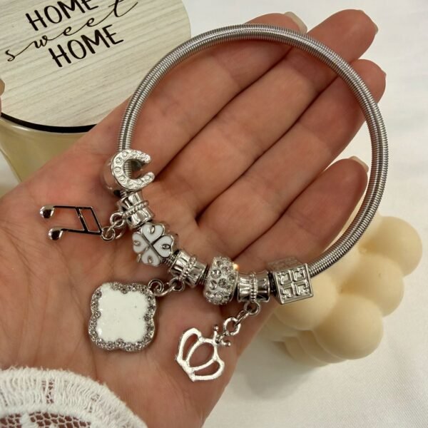 pulsera con dijes pasantes mod 7