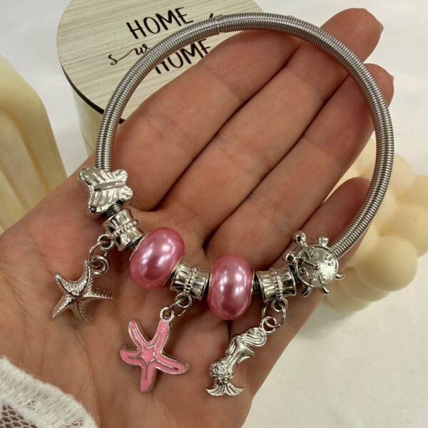 pulsera con dijes pasantes mod 5