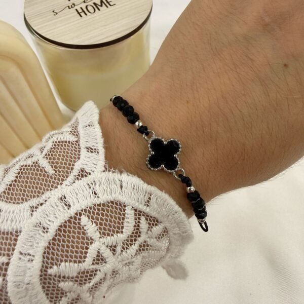 pulsera Van CL ajustables con bolitas facetadas plateadas negras