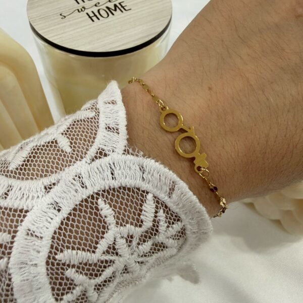 pulseras doradas mod Z 4 (Union simbolo hombre y mujer)