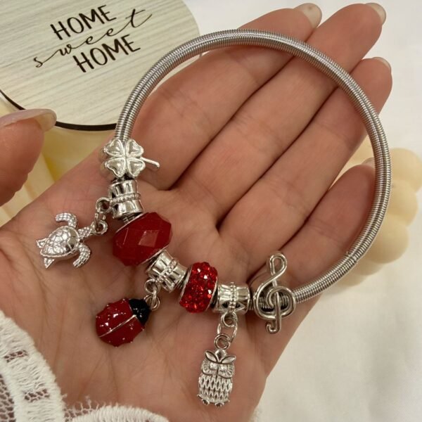 Alternative view of pulsera multidijes mod vaquita ( modelos varios)