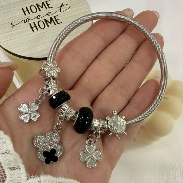 Alternative view of pulsera multidijes mod VC negro ( modelos varios)