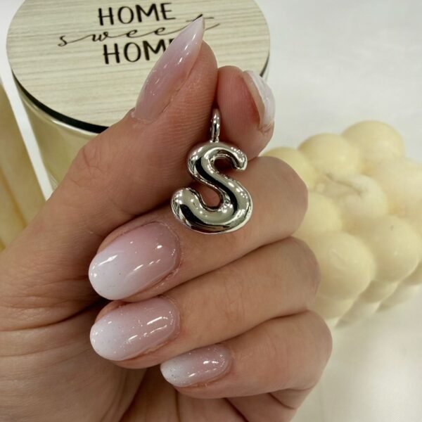 a dije a inicial S a.q