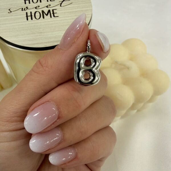 a dije a inicial B a.q