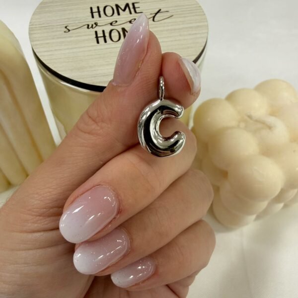 a dije a inicial C a.q