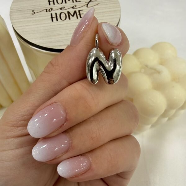 a dije a inicial N a.q