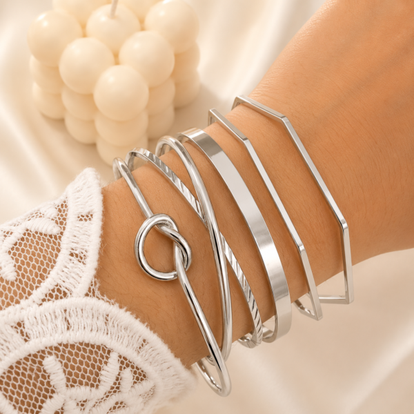 a 0 set x 4 pulseras esclavas plateadas modelo E