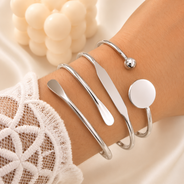 a 0 set x 3 pulseras esclavas plateadas modelo G