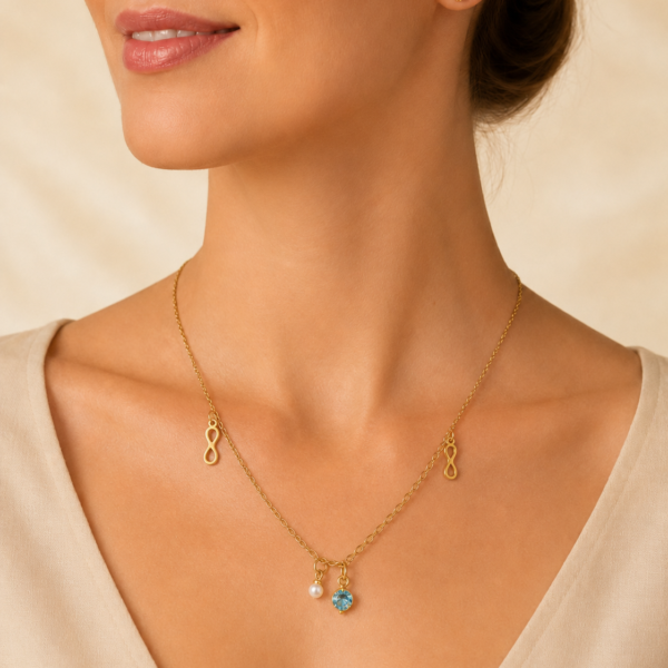 conjunto con dije infinito cubic y aros dorado