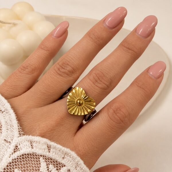 anillo astrid 17 regulable a. quirurgico combinado dorado