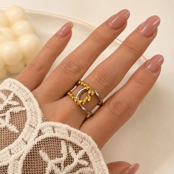anillo astrid 13 regulable a. quirurgico combinado dorado