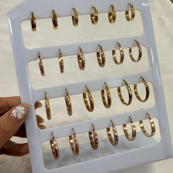 a a blister x 12 pares aros dorados y Rosados