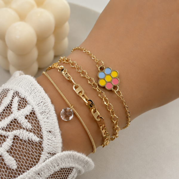 a 0 set x 4 pulseras  dorada modelo H