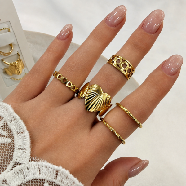a 0 set x 6 anillos dorados modelo 18