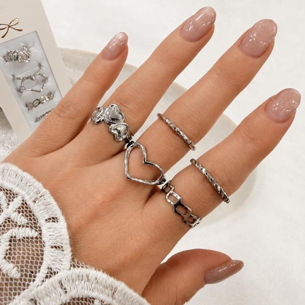 a 0 set x 6 anillos plateados modelo 7