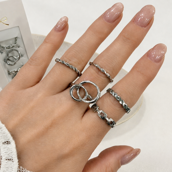 a 0 set x 6 anillos plateados modelo 9