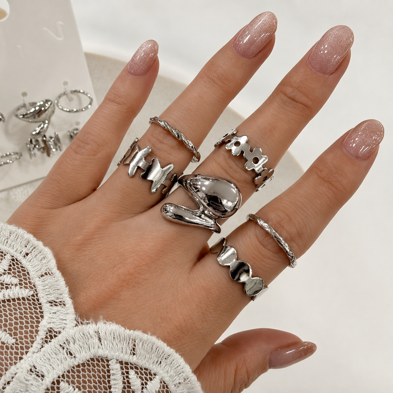 a 0 set x 6 anillos plateados modelo 21